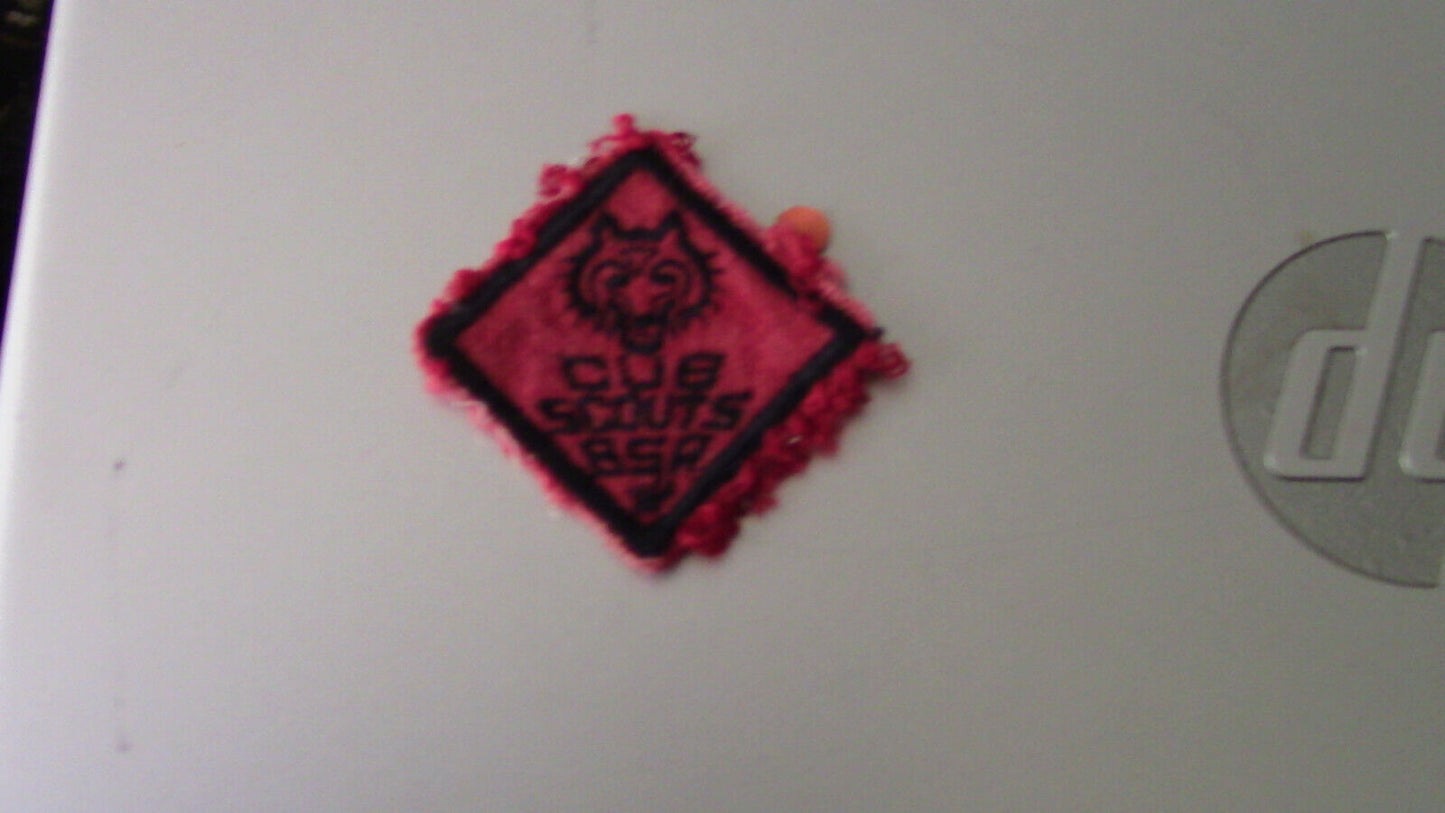 BSA: Vintage (60's) Cub Scout Wolf Rank Patch (Red Background/Black Outline)
