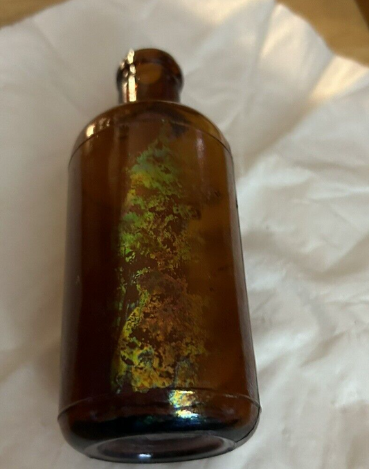 BROWN ROUND BOTTLE UNMARKED 4.5 X 1.75 INCHES EMPTY