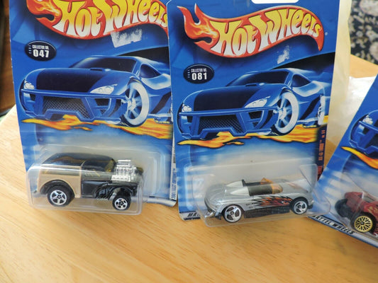 HOT WHEELS SET OF FOUR CARS--# 047, 081, 083, 085