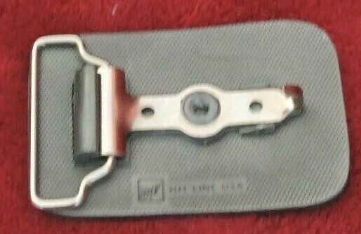 Belt Buckle: Crude Oil Testing Inc.