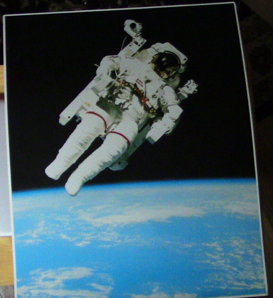 Nasa Space Collection: Astronaut Propelled by a Manned Maneuvering Unit 1990