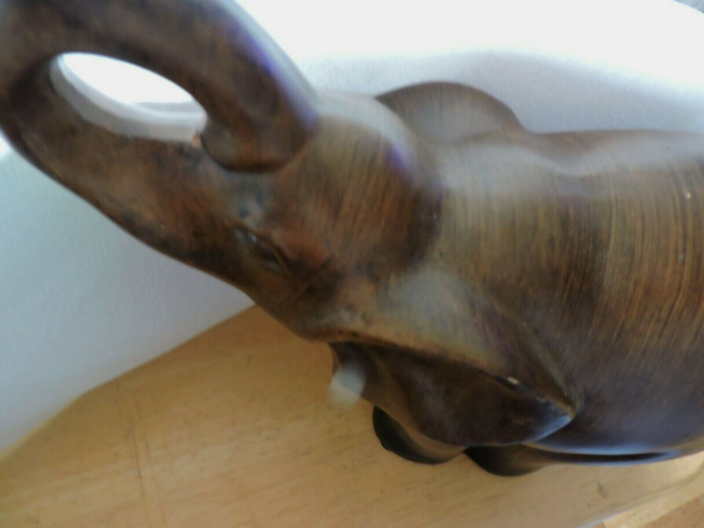 CERAMIC BROWN ELEPHANT--10 INCHES TALL, 12 INCHES LONG, BASE IS 4X4 INCHES