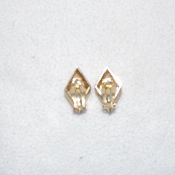 Vintage Costume Earrings Gold with a bust of a women in each of them.