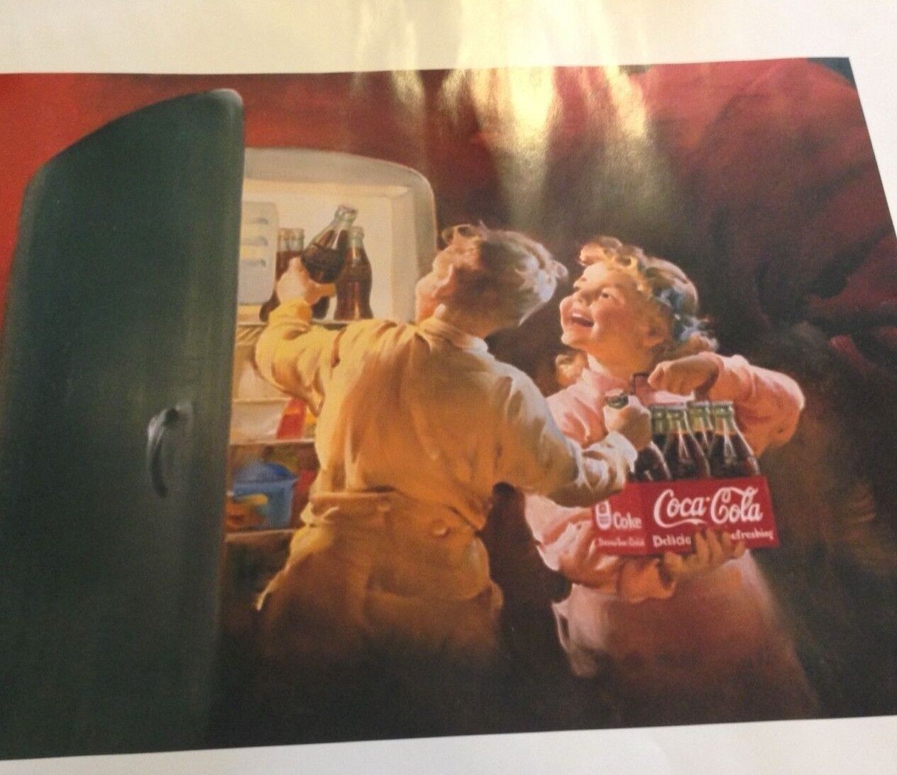 COCA COLA 1995 REPRO OF POSTER-TWO CHILDREN GETTING COKE FROM THE FRIDGE.