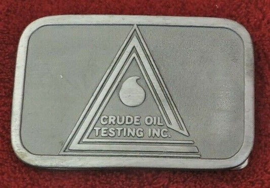 Belt Buckle: Crude Oil Testing Inc.