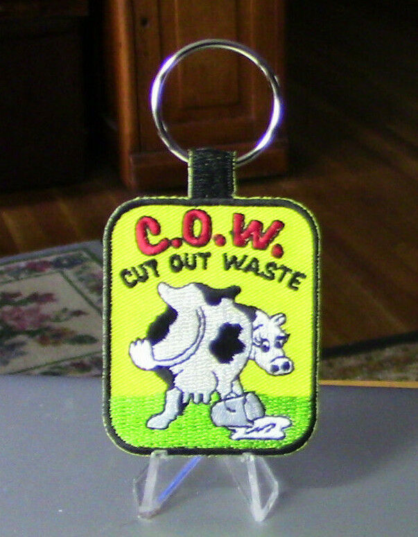 "Cut Out Waste" COW Key Ring