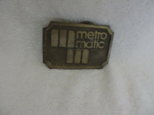 METRO MATIC INC. BELT BUCKLE 3 X 2 INCHES