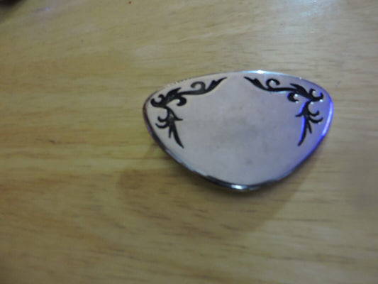 BELT BUCKLE  SILVER WITH BLACK DESIGN TRIANGULAR SHAPE 3X2 INCHES