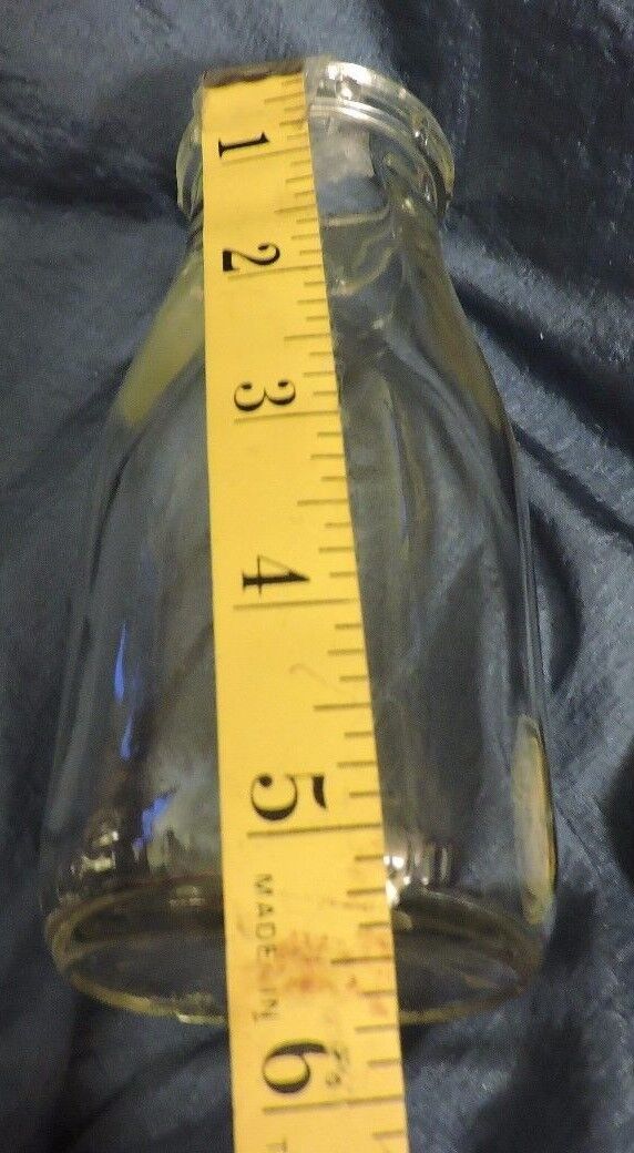 DOUGLAS MILK BOTTLE NUMBERED 9 AND 55-NO LID