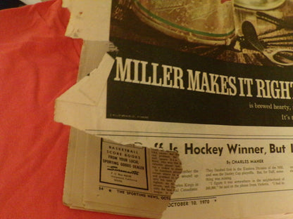 THE SPORTING NEWS