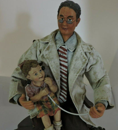 DOCTOR WITH YOUNG GIRL FIGURINE--NOT MARKED OR DATED