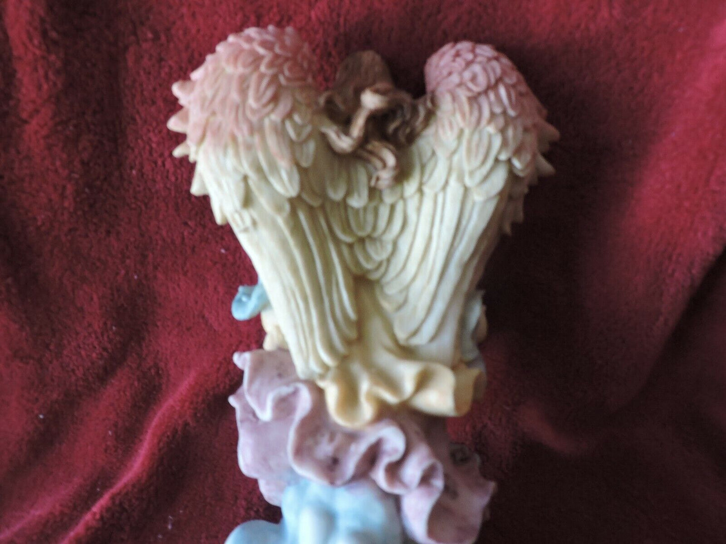 ANGEL HOLDING BABY PORCLAIN FIGURINE
