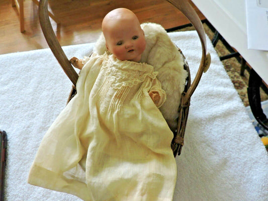 VINTAGE ARMANO MARSEILLE  GERMAN DOLL  1924 SOLID-DOMEQIQUE  IN WICKER BASKET
