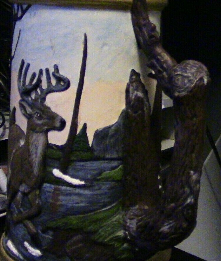 CERAMIK MUG WITH DEER FAMILY PAINTED ON IT  15.5 INCHES TALL/ TOP 4 INCHES BASE