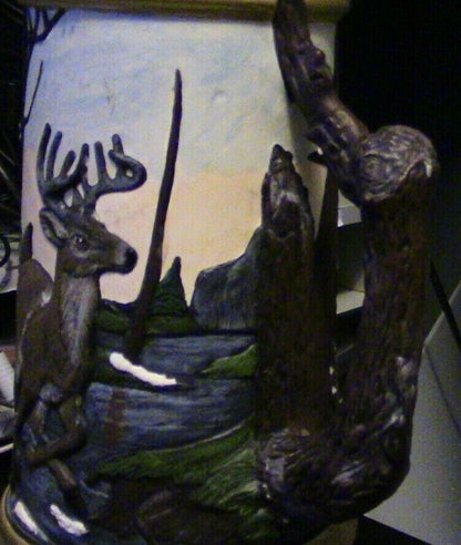 CERAMIK MUG WITH DEER FAMILY PAINTED ON IT  15.5 INCHES TALL/ TOP 4 INCHES BASE