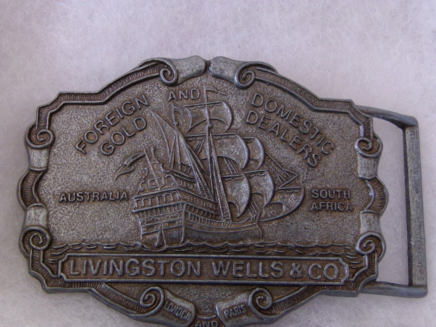 Livingston Wells & Co Foreign & Domestic Gold Dealers Advertising Belt Buckle