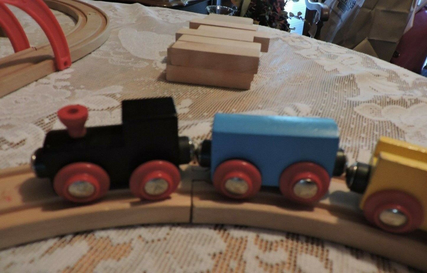 WOODEN TRAIN TRACK AND 4 PIECE TRAIN SET