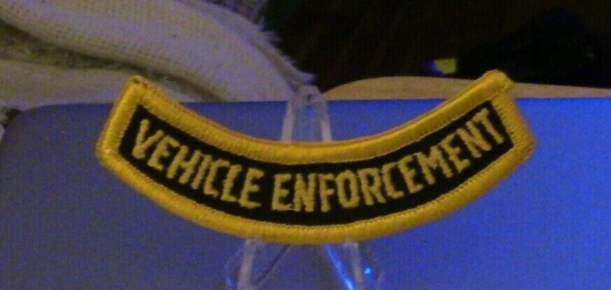 3 1/2" Gold Letters/Black Background Rocker Patch: "Vehicle Enforcement"
