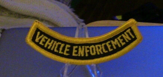 3 1/2" Gold Letters/Black Background Rocker Patch: "Vehicle Enforcement"