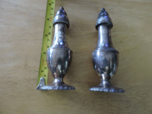 SILVER SALT AND PEPPER SHAKERS:  (5X1.5 INCHES) MADE IN THE USA