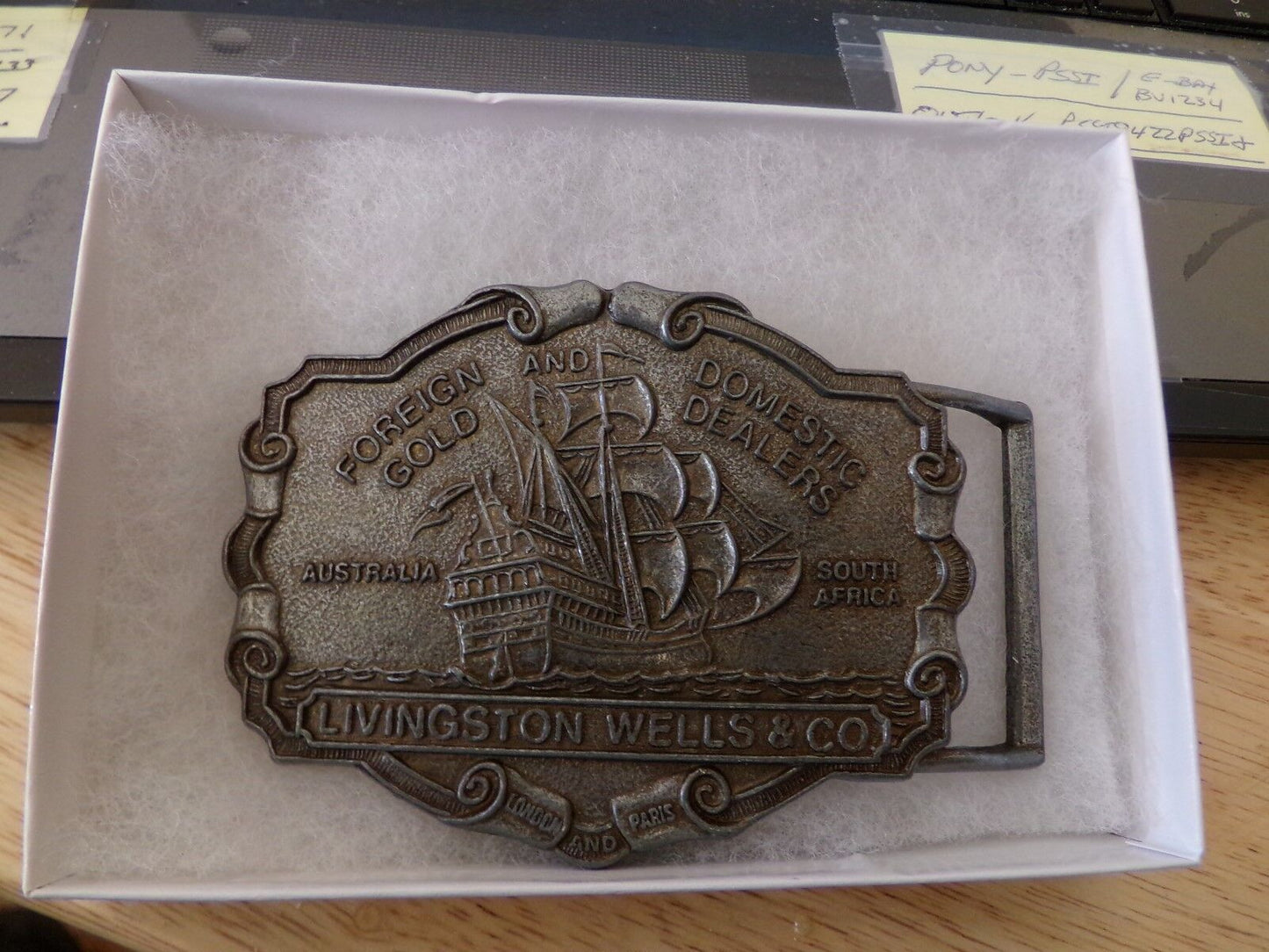 Livingston Wells & Co Foreign & Domestic Gold Dealers Advertising Belt Buckle