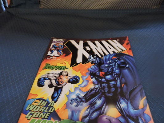 X MAN TRAPPED N A WORLD GONE MAD! NO.  56 OCTOBER 1999
