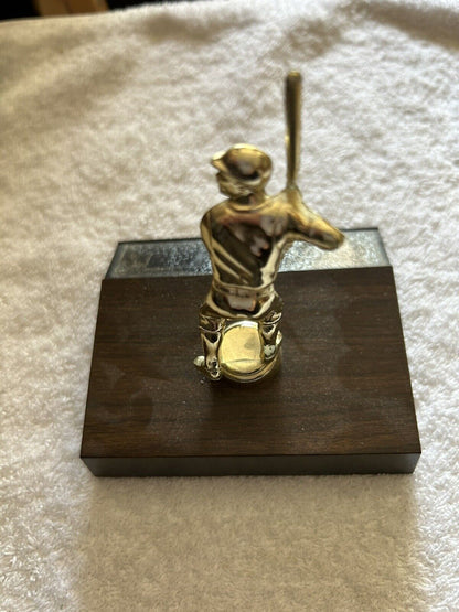 TROPHY: BATTER --PLASTIC--WOOD BASE--4.5X3.5X 4 INCHES