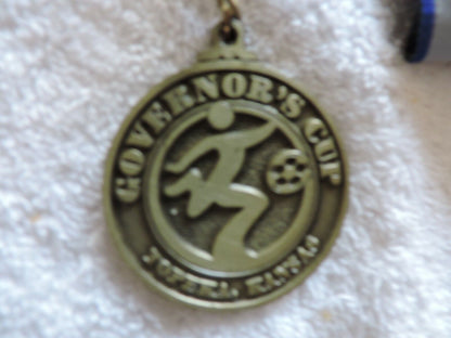 GOVERNOR'S CUP SOCCER MEDAL, TOPEKA, KS--2 INCH ROUND