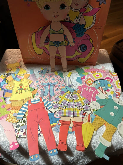 WHITMAN BABY GO BYE BYE PAPER DOLL AND CLOTHES ( BUGGY NOT INCLUDED) 1971