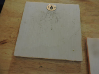 PAIR OF CERAMIC PLAQUES (WALL HANGINGS) 5.5X5.5 INCHES