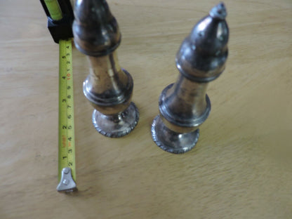 SILVER SALT AND PEPPER SHAKERS:  (5X1.5 INCHES) MADE IN THE USA