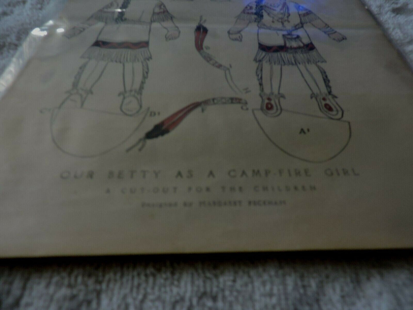 FEBRUARY 1914: " OUR BETTY AS A CAMP FIRE GIRL" CUT OUT: DESIGNED BY MARGARET PE