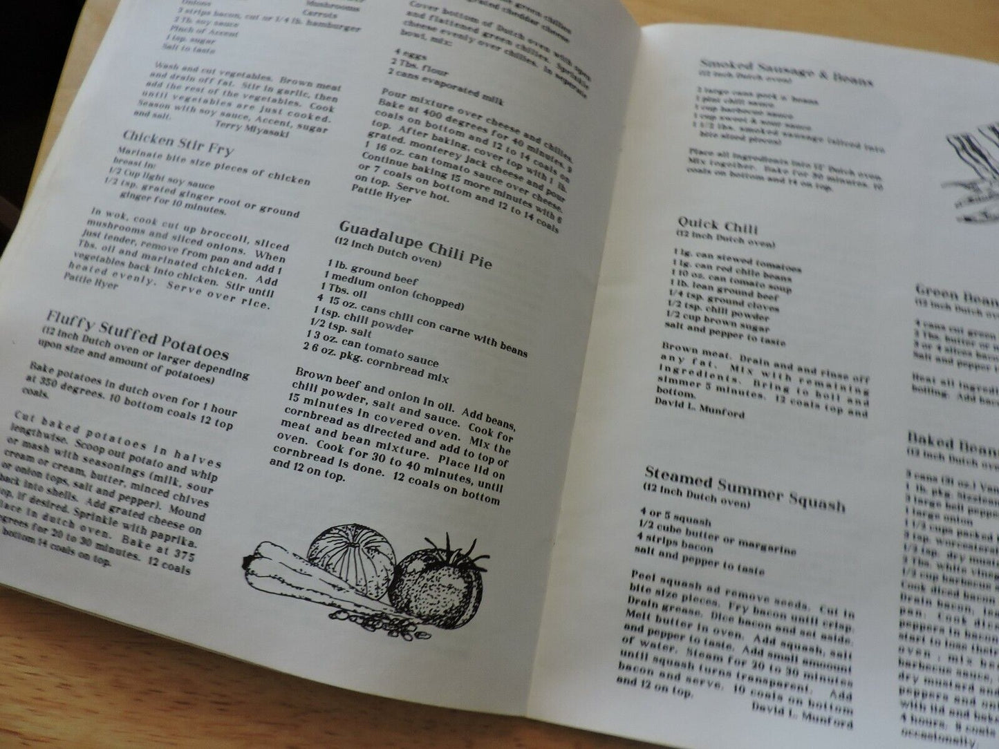 CAST IRON CRUISINE EXCITING ASSORTMENT OF OUTDOOR RECIPES 1990 USED
