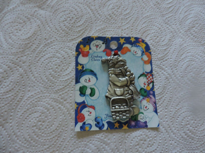 A LINDSAY CLAIRE DESIGN PEWTER SMOWWOMAN ORNAMENT