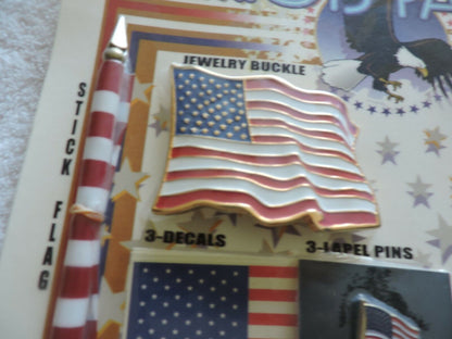 PATRIOT PACKAGE: 2 STICK FLAGS, BELT BUCKLE, MAGNET, 3 FLAG DECALS, 3 LAPEL PINS