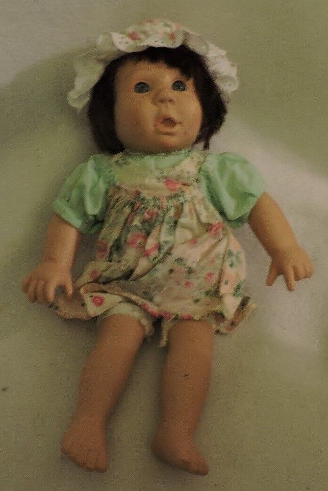 Vintage Porcelain Baby Doll with Original Dress and Bonnet.