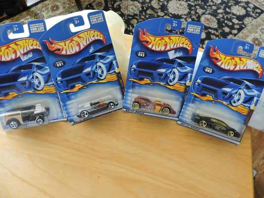 HOT WHEELS SET OF FOUR CARS--# 047, 081, 083, 085