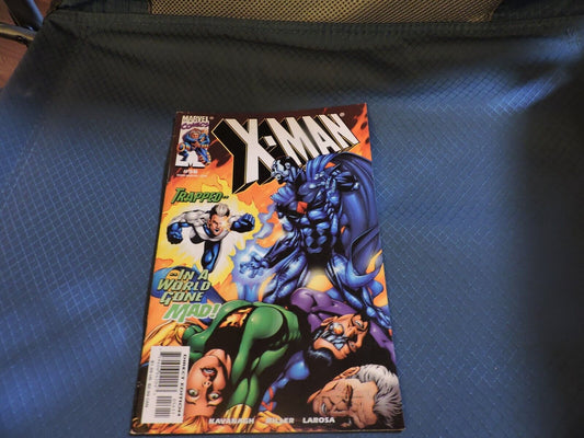 X MAN TRAPPED N A WORLD GONE MAD! NO.  56 OCTOBER 1999
