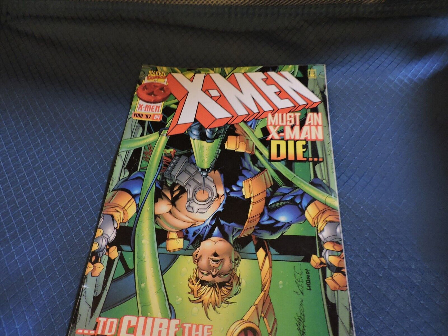 XMEN: MUST AN XPMAN DIE TO CURE THE LEGACY VIRUS?! NUMBER 64 MAY 1997