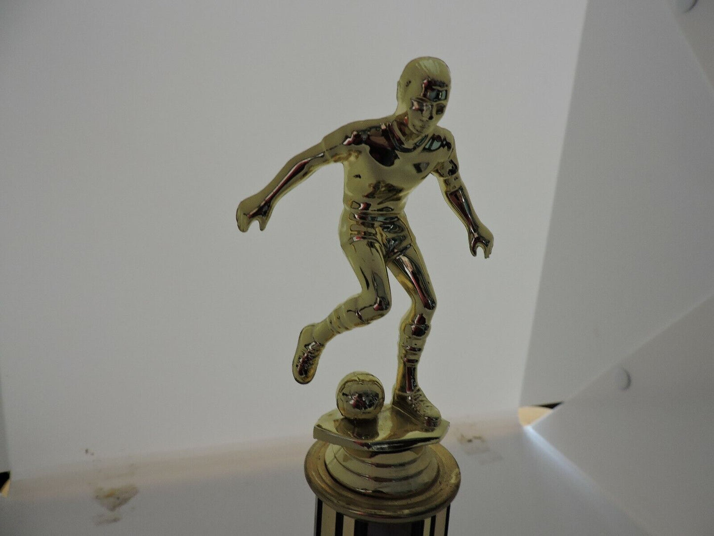 SOCCER TROPHY--10.5  INCHES TALL, 3X4 INCH WHITE MARBEL BASE