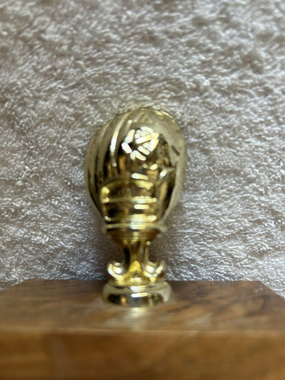 TROPHY: BASEBALL GLOVE--PLASTIC--WOOD BASE--3.75X3.5X3 INCHES