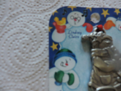 A LINDSAY CLAIRE DESIGN PEWTER SMOWWOMAN ORNAMENT