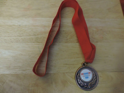 MEDAL MISSOURI WINTER GAMES 10 TH ANNUAL SPRINGFIELD MO 2 INCHES RED RIBBON