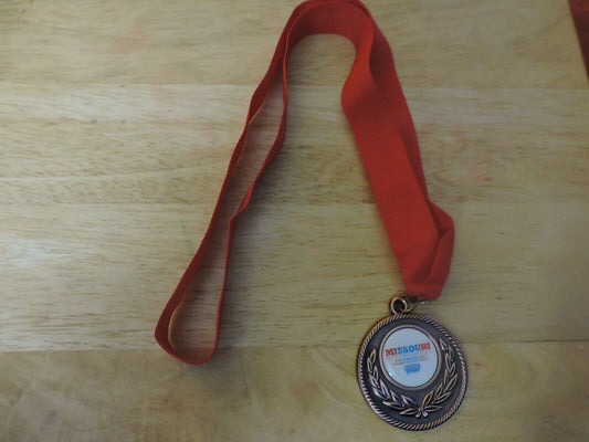 MEDAL MISSOURI WINTER GAMES 10 TH ANNUAL SPRINGFIELD MO 2 INCHES RED RIBBON