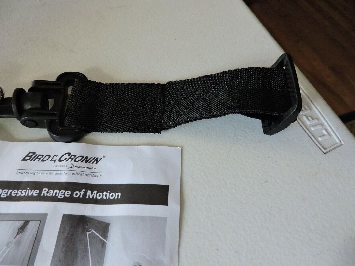PROGRESSIVE RANGE OF MOTION PULLEY SYSTEM: OVER THE DOOR PULLEY STRAP