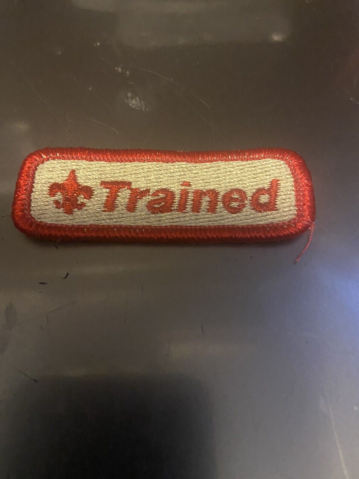 Official BSA: "Trained"  Uniform Tab Patch