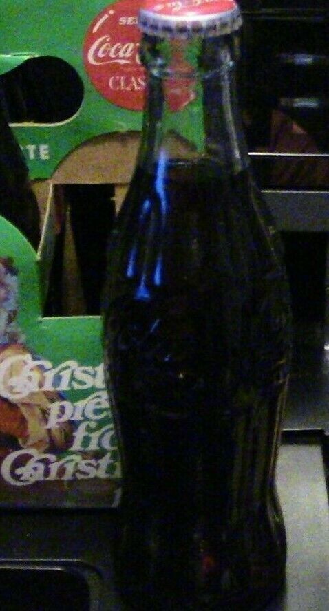 6 Pack of Coca Cola Bottles Celebrating Christmas