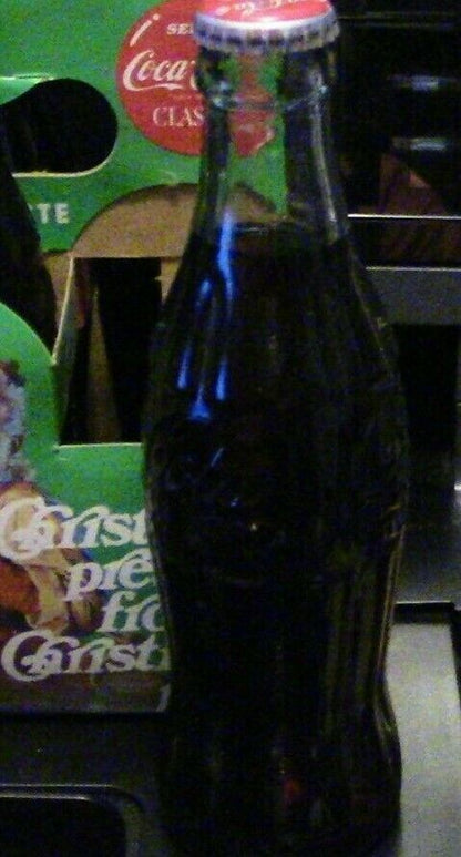 6 Pack of Coca Cola Bottles Celebrating Christmas