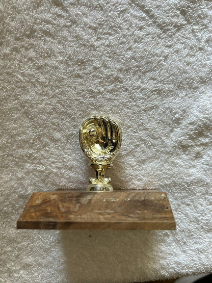 TROPHY: BASEBALL GLOVE--PLASTIC--WOOD BASE--3.75X3.5X3 INCHES