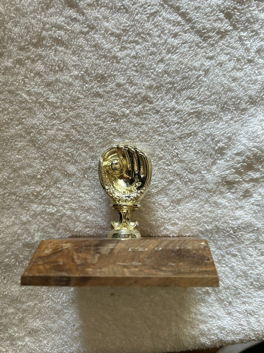TROPHY: BASEBALL GLOVE--PLASTIC--WOOD BASE--3.75X3.5X3 INCHES
